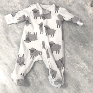 Cute very soft Carter’s preemie sleeper with lambs on it (in like new condition)